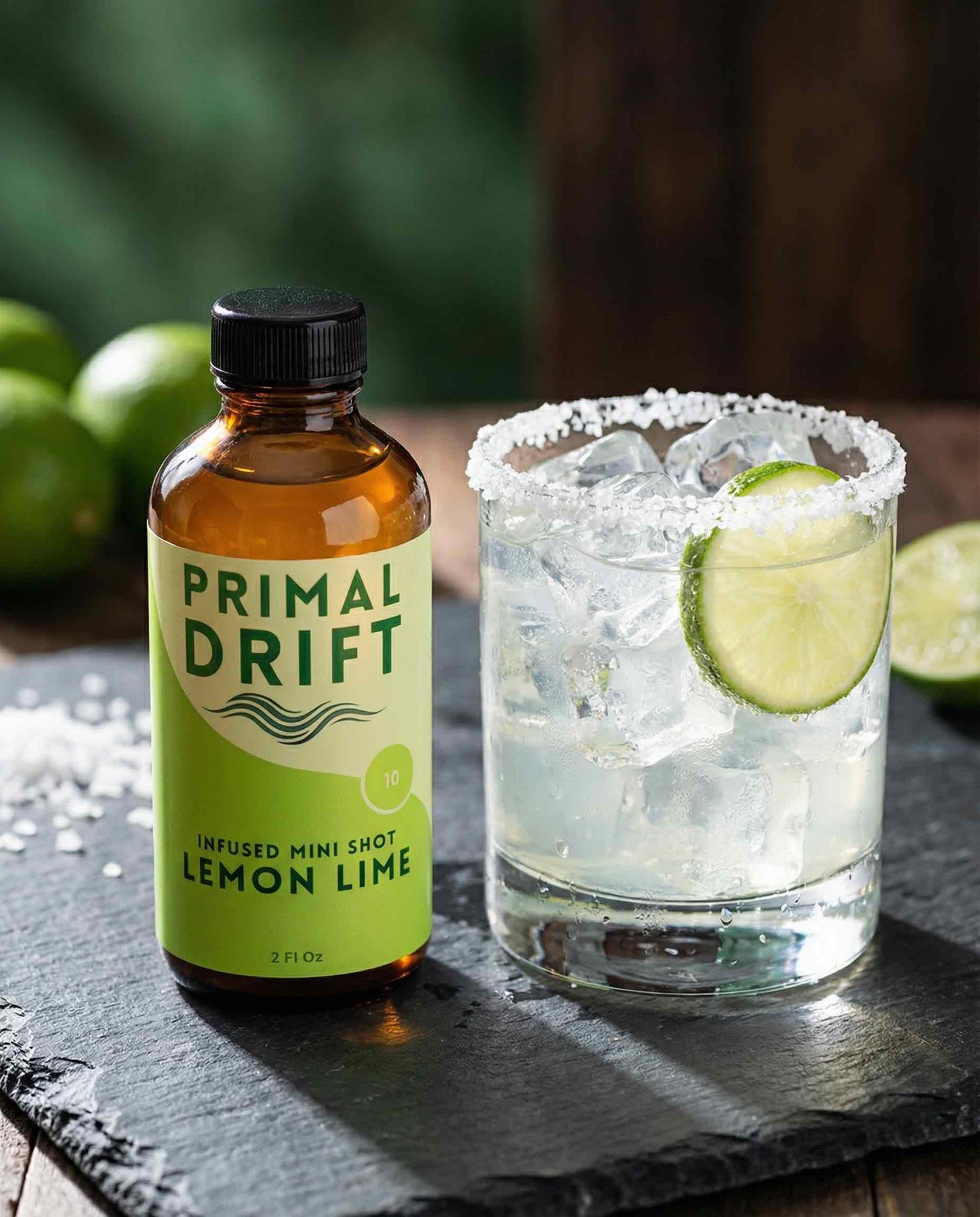 Primal Drift Lemon Lime THC Mini Shot next to a Margarita glass